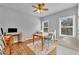 Office features hardwood floors, neutral walls, and ample natural light at 4119 Alayna Lee Cir, Mcdonough, GA 30252