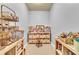 Well-organized room with storage shelves and natural light, ideal for hobbies at 4119 Alayna Lee Cir, Mcdonough, GA 30252