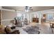 Finished basement with a wet bar, lounge area, and natural light, perfect for entertaining at 6597 River Island Drive Dr, Buford, GA 30518