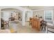 Spacious finished basement featuring a bar area, seating, and windows for ample light at 6597 River Island Drive Dr, Buford, GA 30518