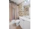 Cozy bathroom featuring classic fixtures and neutral tile, blending comfort and style at 6597 River Island Drive Dr, Buford, GA 30518
