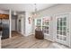 View of the eat in kitchen shows lots of light, outside access and stainless appliances at 6597 River Island Drive Dr, Buford, GA 30518