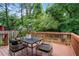 Relaxing back deck features wood flooring, natural light, and room to entertain at 1564 Belva Ave, Decatur, GA 30032