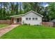 Charming single-story home with a well-maintained lawn, freshly painted exterior, and a welcoming front porch at 1564 Belva Ave, Decatur, GA 30032