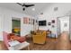 Spacious living room with modern decor, hardwood floors, and a comfortable seating area perfect for relaxation at 1564 Belva Ave, Decatur, GA 30032