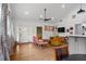 Bright living room featuring hardwood floors, recessed lighting, and comfortable seating arrangements at 1564 Belva Ave, Decatur, GA 30032