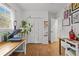 Home office with hardwood floors, closet, neutral walls, and a press at 1564 Belva Ave, Decatur, GA 30032