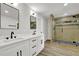 Bathroom featuring dual vanity, modern fixtures, and a luxurious walk-in shower at 336 Fond Du Lac Dr, Stone Mountain, GA 30088