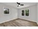 Bedroom with a ceiling fan, fresh paint, and lots of natural light at 336 Fond Du Lac Dr, Stone Mountain, GA 30088