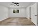 Bright and airy bedroom featuring hardwood flooring and a walk-in closet at 336 Fond Du Lac Dr, Stone Mountain, GA 30088