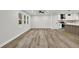 Spacious living room featuring hardwood flooring, recessed lighting, and an open-concept floor plan at 336 Fond Du Lac Dr, Stone Mountain, GA 30088
