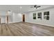 Spacious living room featuring hardwood flooring, recessed lighting, and a stair case at 336 Fond Du Lac Dr, Stone Mountain, GA 30088