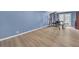 Finished basement area featuring durable floors and a home gym ready for exercise at 3451 Falls Branch Ct, Buford, GA 30519