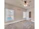 Bright bedroom with a ceiling fan and natural light, creating a cozy atmosphere at 3451 Falls Branch Ct, Buford, GA 30519