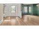 Spacious foyer with hardwood floors and a grand front door with sidelights at 3451 Falls Branch Ct, Buford, GA 30519