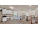 Hallway with carpet, railing, cabinets, and a desk at 3451 Falls Branch Ct, Buford, GA 30519