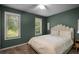 Serene bedroom featuring natural light and a comfortable bed at 5679 Bay Harbor Nw Trl, Acworth, GA 30101