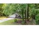 Charming two-story home with mature trees in a beautifully landscaped yard at 5679 Bay Harbor Nw Trl, Acworth, GA 30101