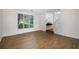 Bright living room with hardwood floors and natural light at 5679 Bay Harbor Nw Trl, Acworth, GA 30101