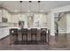 Gorgeous kitchen featuring an island with seating, stainless steel appliances, and white cabinets at 1231 Fawndale Nw Dr, Kennesaw, GA 30152