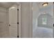 A walk-in closet with ample shelving for storage at 1231 Fawndale Nw Dr, Kennesaw, GA 30152