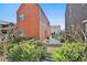A well-kept backyard with lush greenery, patio, and charcoal grill at 175 Central Ave, Fayetteville, GA 30214