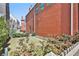 Cozy backyard featuring a well-maintained lawn and brick home at 175 Central Ave, Fayetteville, GA 30214