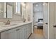 Bright bathroom featuring double vanities with stone countertops and modern fixtures at 175 Central Ave, Fayetteville, GA 30214