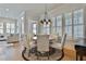 Cozy dining area featuring natural light and a view of the living room at 175 Central Ave, Fayetteville, GA 30214