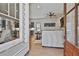 Inviting foyer showcasing hardwood floors, open layout, and seamless flow into the living spaces at 175 Central Ave, Fayetteville, GA 30214