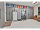 Well-organized garage featuring ample cabinet storage and a clean, epoxy floor at 175 Central Ave, Fayetteville, GA 30214