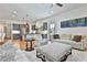 Spacious living area with an open layout and a view of the adjacent kitchen and dining area at 175 Central Ave, Fayetteville, GA 30214