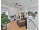 Cozy loft space with hardwood floors, seating area, and an abundance of natural light at 175 Central Ave, Fayetteville, GA 30214
