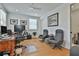 Spacious office with hardwood floors, natural light, and adjacent bathroom access at 175 Central Ave, Fayetteville, GA 30214
