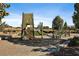 Community playground with wooden structures and slide, designed for hours of fun at 175 Central Ave, Fayetteville, GA 30214
