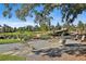 Beautiful pond view with surrounding homes and common areas, creating a serene environment at 175 Central Ave, Fayetteville, GA 30214