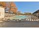 Resort-style pool area with numerous lounge chairs for relaxing and enjoying the sun at 175 Central Ave, Fayetteville, GA 30214