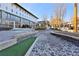 Beautifully landscaped public space with stone pathways, benches, and elegant lighting fixtures at 175 Central Ave, Fayetteville, GA 30214