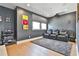 Home theater room with leather seating, projector, and modern sound system at 175 Central Ave, Fayetteville, GA 30214
