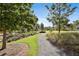 Scenic walking path through the community's green space, perfect for enjoying the outdoors at 175 Central Ave, Fayetteville, GA 30214