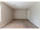 Large bedroom features plush carpeting and fresh, neutral paint at 3694 Rolling Pl, Conley, GA 30288