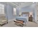 Comfortable bedroom with large windows and a tufted headboard at 4084 Peachtree Dunwoody Rd, Atlanta, GA 30342