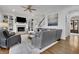 Inviting living room with fireplace, built-in bookshelves, and hardwood floors at 4084 Peachtree Dunwoody Rd, Atlanta, GA 30342