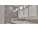 Bathtub and separate shower with natural light pouring in from large picture window at 4084 Peachtree Dunwoody Rd, Atlanta, GA 30342