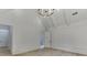 Spacious bedroom with high ceilings, decorative trim, and a view to the Primary bath at 4459 Grady Smith Rd, Loganville, GA 30052