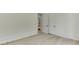 Clean, light-filled bedroom with hardwood floors and white trim at 4459 Grady Smith Rd, Loganville, GA 30052