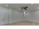 Large bonus room with hardwood floors, crown molding, and recessed lighting at 4459 Grady Smith Rd, Loganville, GA 30052