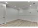 Bonus room with custom trim and recessed lighting with decorative lighting at 4459 Grady Smith Rd, Loganville, GA 30052
