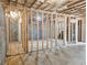 Unfinished basement with concrete floor and exposed wood framing, offering space to add value at 5728 Williams Rd, Norcross, GA 30093