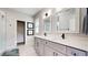 Elegant bathroom featuring dual sinks, modern fixtures, and a large vanity for ample storage at 5728 Williams Rd, Norcross, GA 30093